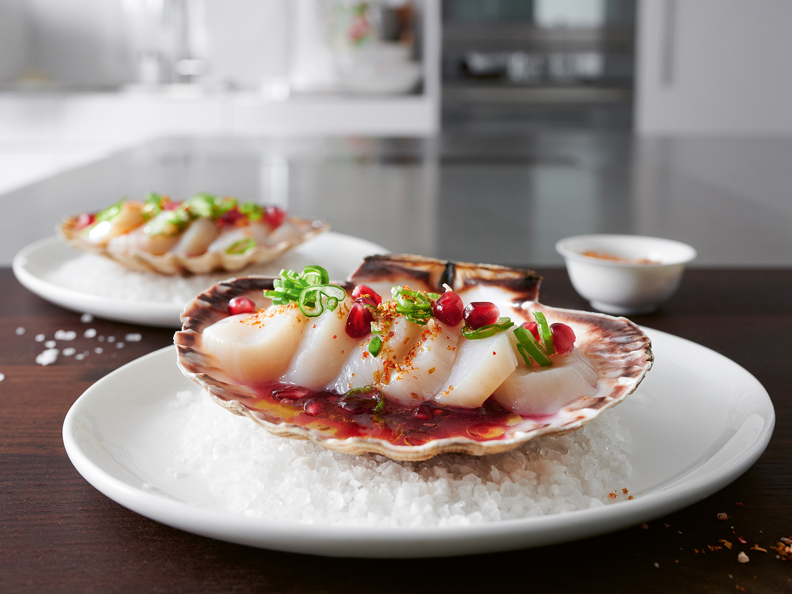 Carpaccio von Coquilles St. Jacques mit Granatapfel